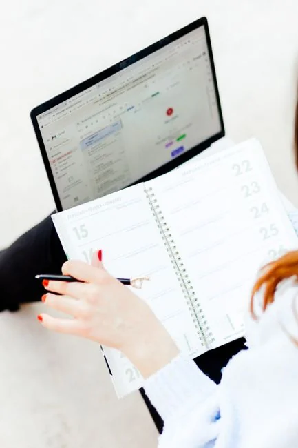 Open planner with Hashtag Campaign handwritten next to keyboard. Ideal for social media and productivity themes.